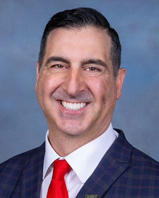 Board member Byron Decoteau